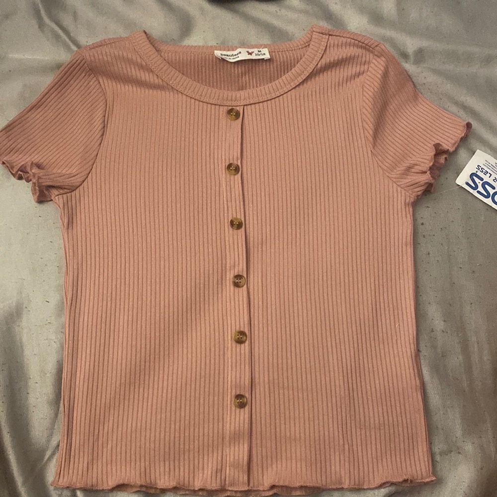 Was bought and never worn.
